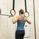 Woman Doing A Pull-Up in Rings